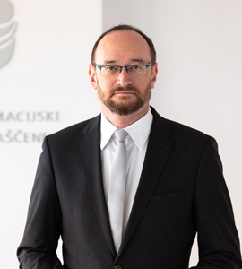 Mag. Andrej Tom�i�